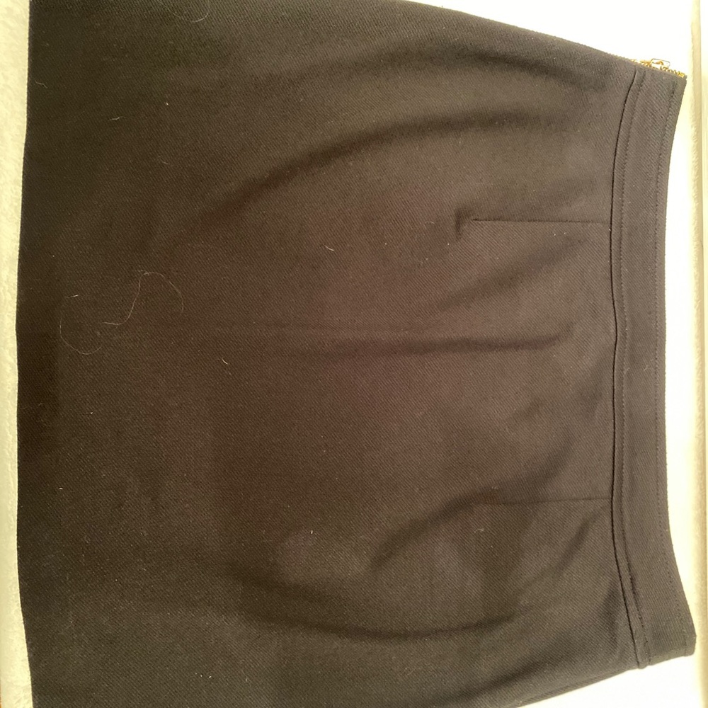 Black mini with gold zipper